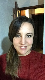 woman in red sweater with brown hair